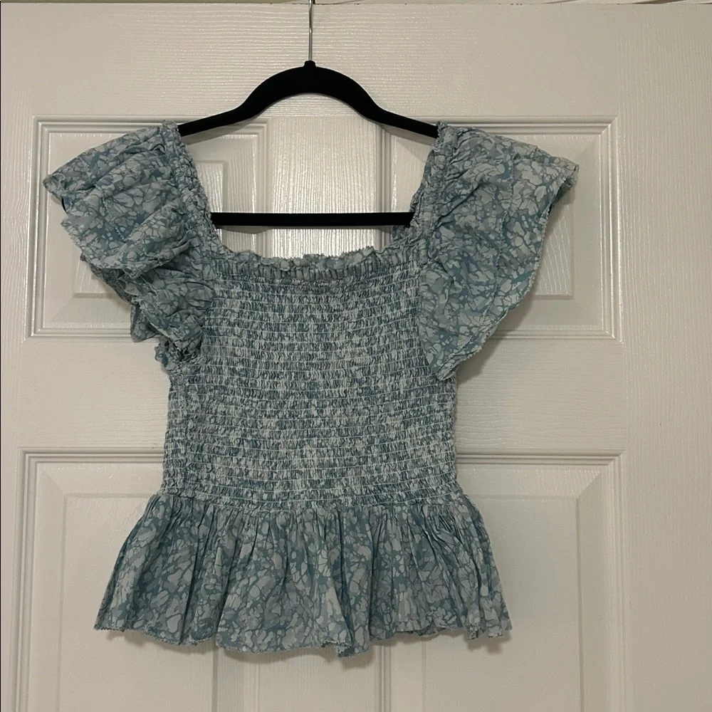 Love the Label Anthropologie Blue Flutter Sleeve Smocked Peplum Blouse